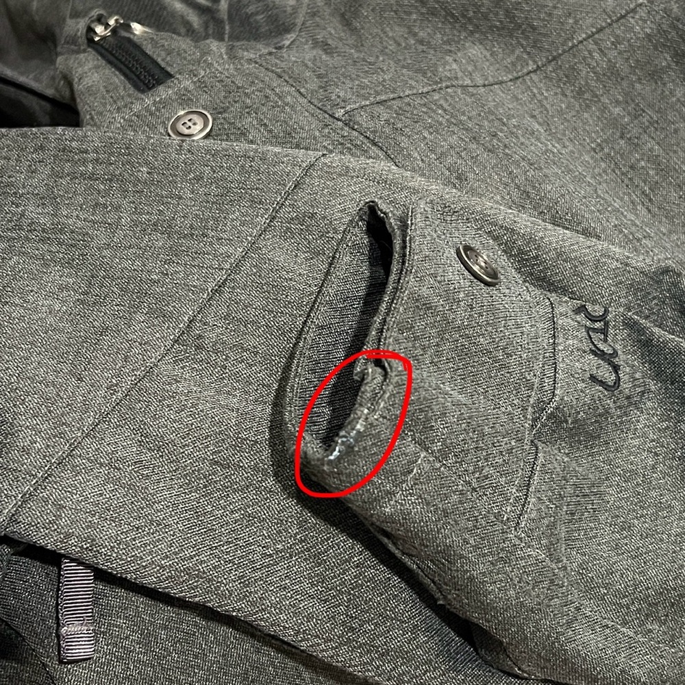 damage on burton snowboard jacket listed below